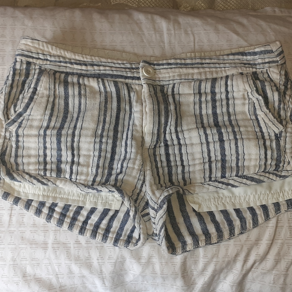 These blue and white stripped shorts are from Free People, and a size 2 in woman